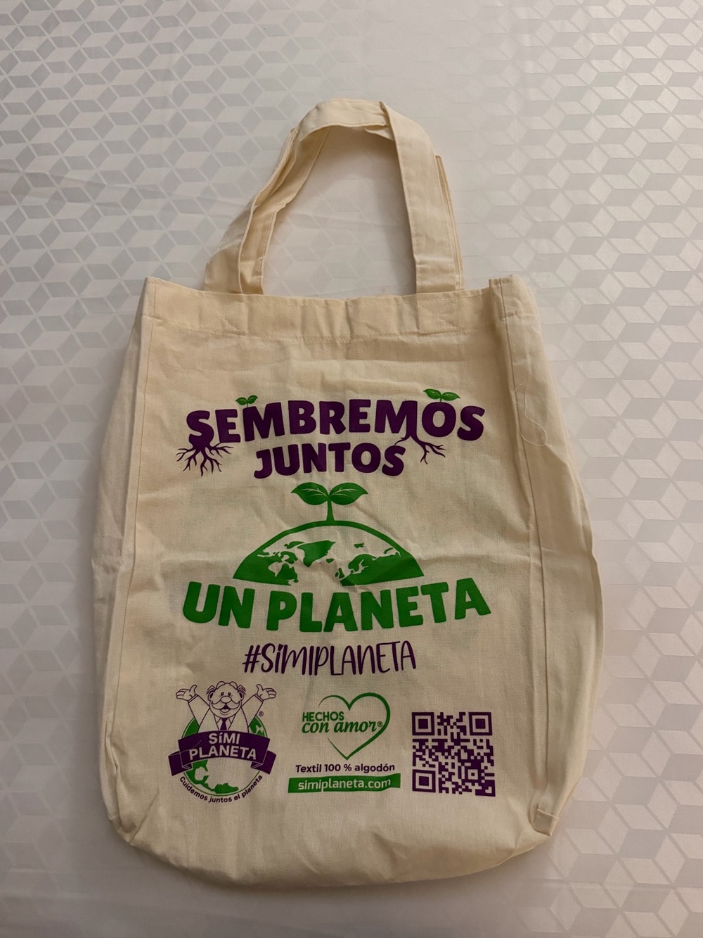 Sembremos Juntos Un Planeta Cotton Tote Bag — Natural with Green & Purple Print